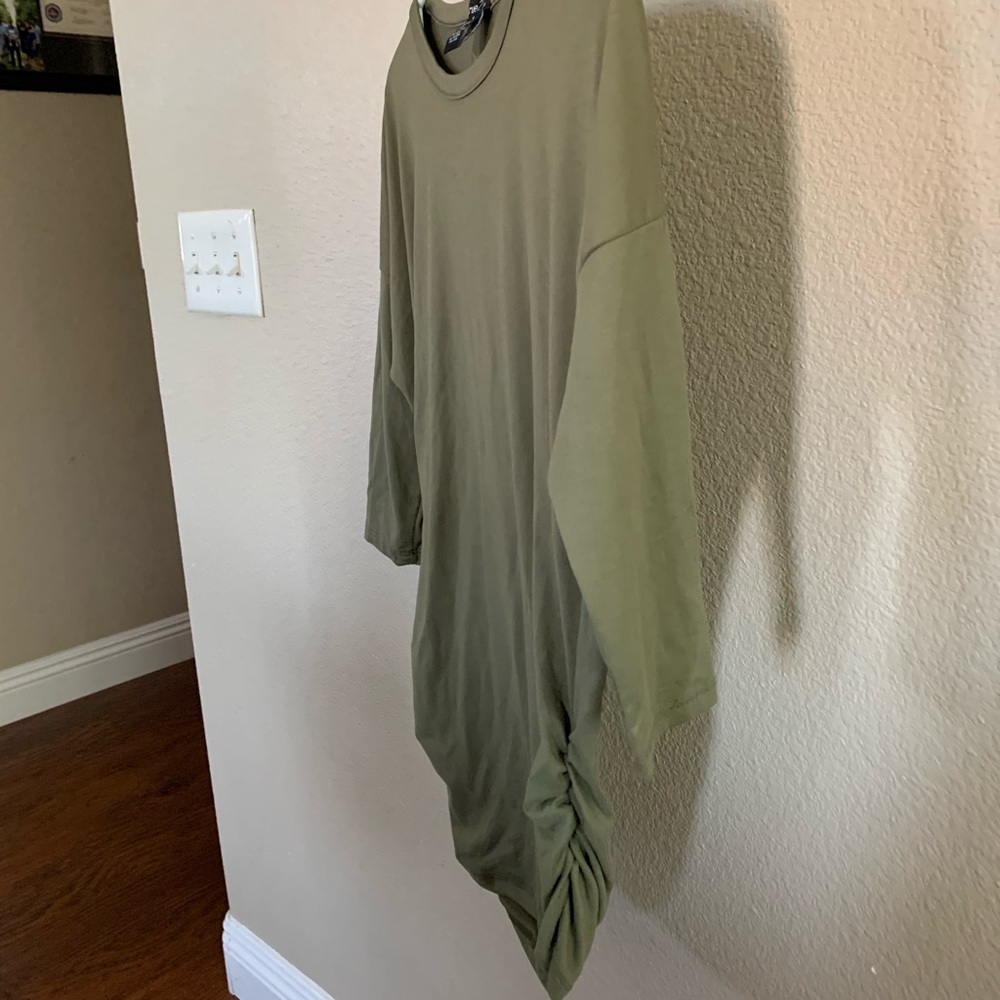 Green, quarter length sleeve fitted dress